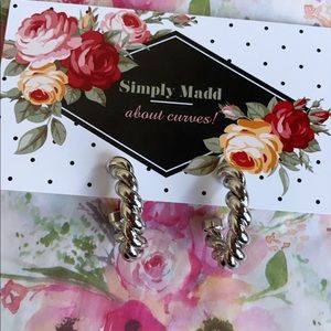 Silver hoop earrings.